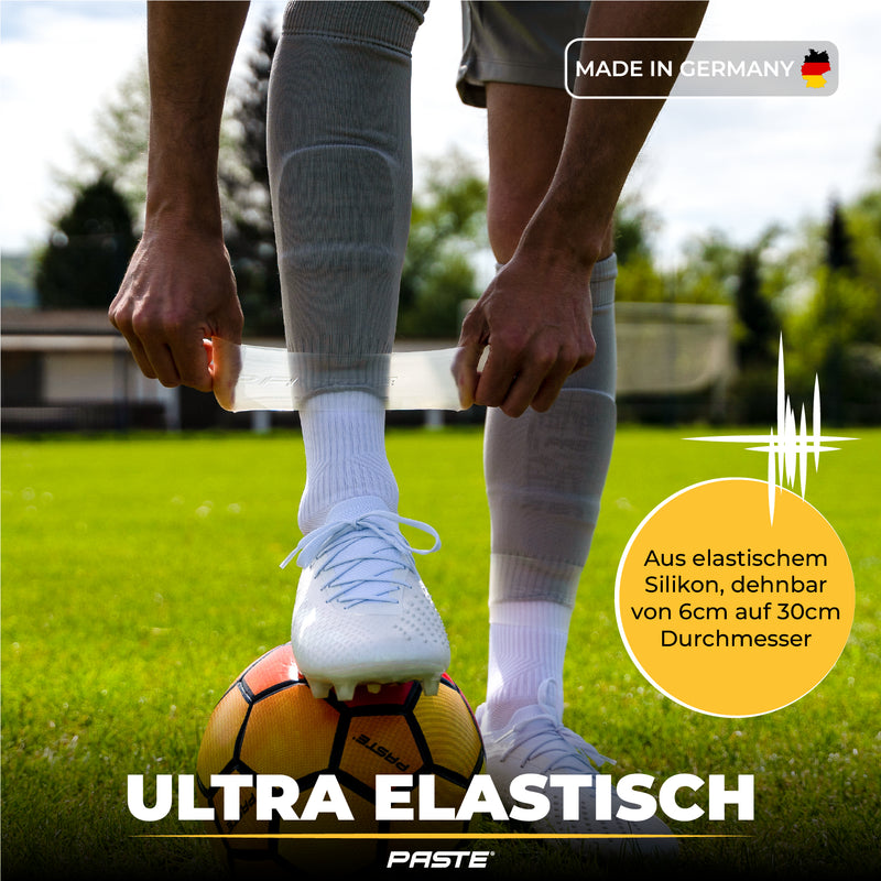 PASTE® Sujeta espinilleras de silicona de fútbol para hombres - Transparente