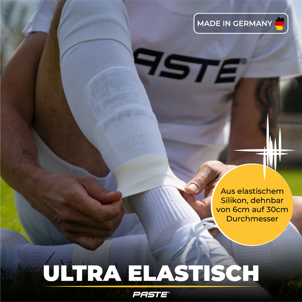 PASTE® Reggi parastinchi da calcio per uomo in silicone - Bianco